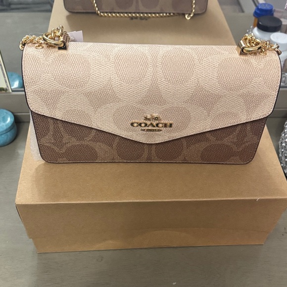 Coach Handbags - NEW COACH ENVELOPE CROSSBODY PURSE (color:Sand/tan)